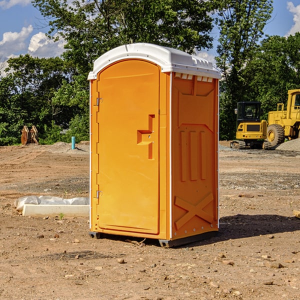 what is the cost difference between standard and deluxe porta potty rentals in Rialto